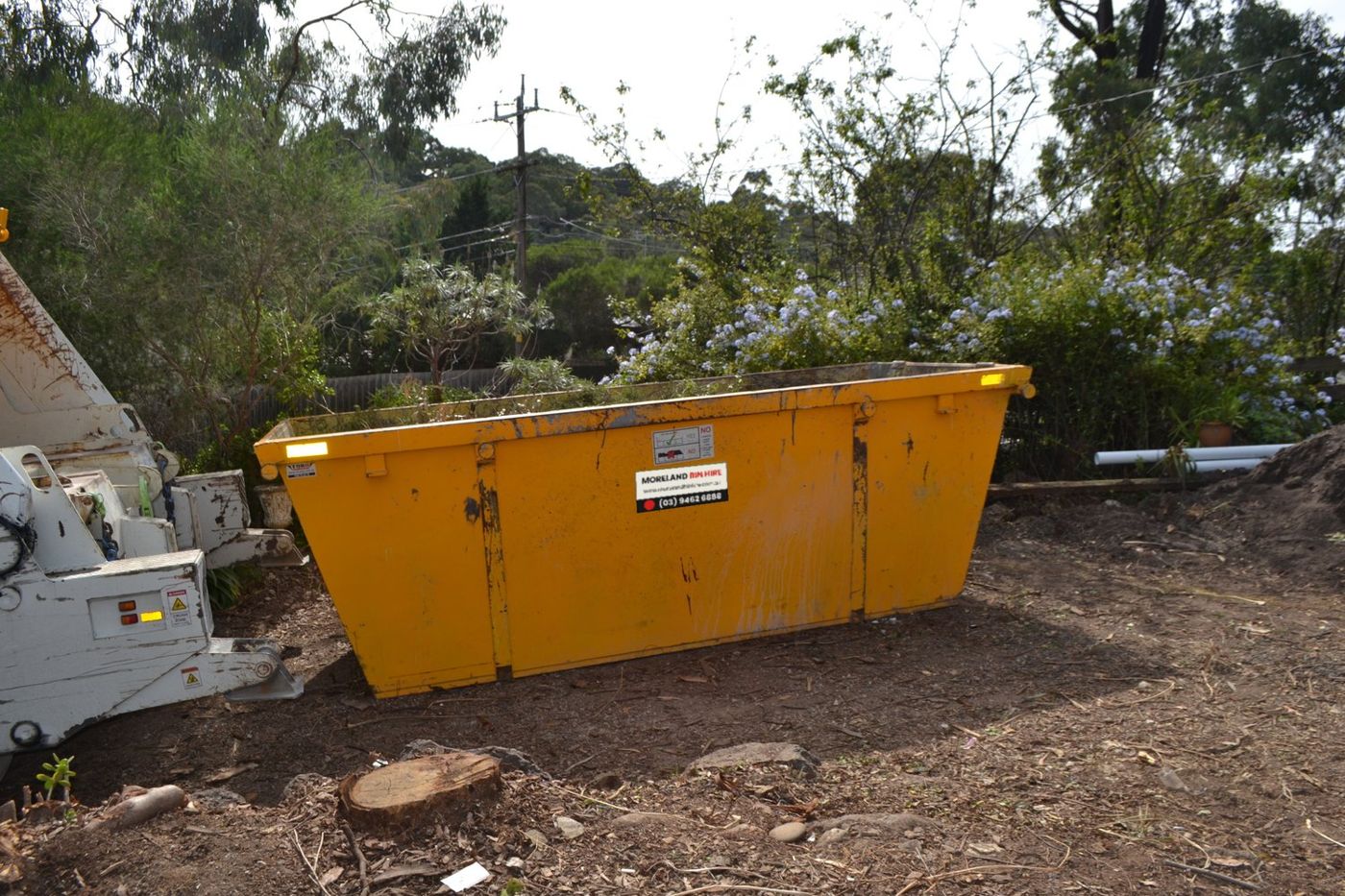 Walk-in skip bin from Moreland Bin Hire on a residential building site